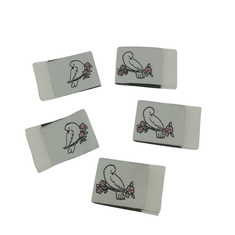 Kreativartikel.ch Weblabel mit annähkante Vogel auf Ast 20 x 30mm 630 9925 000