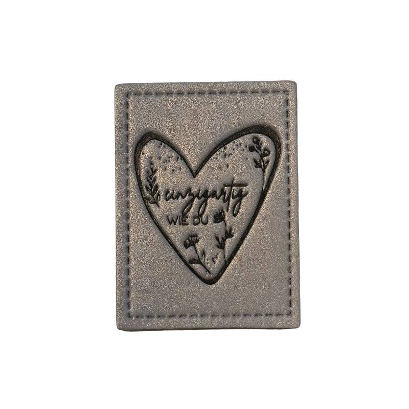 [629 3451 000] "Einzigartig WIE DU" reflektierendes Kunstleder Label 3 x 4 cm